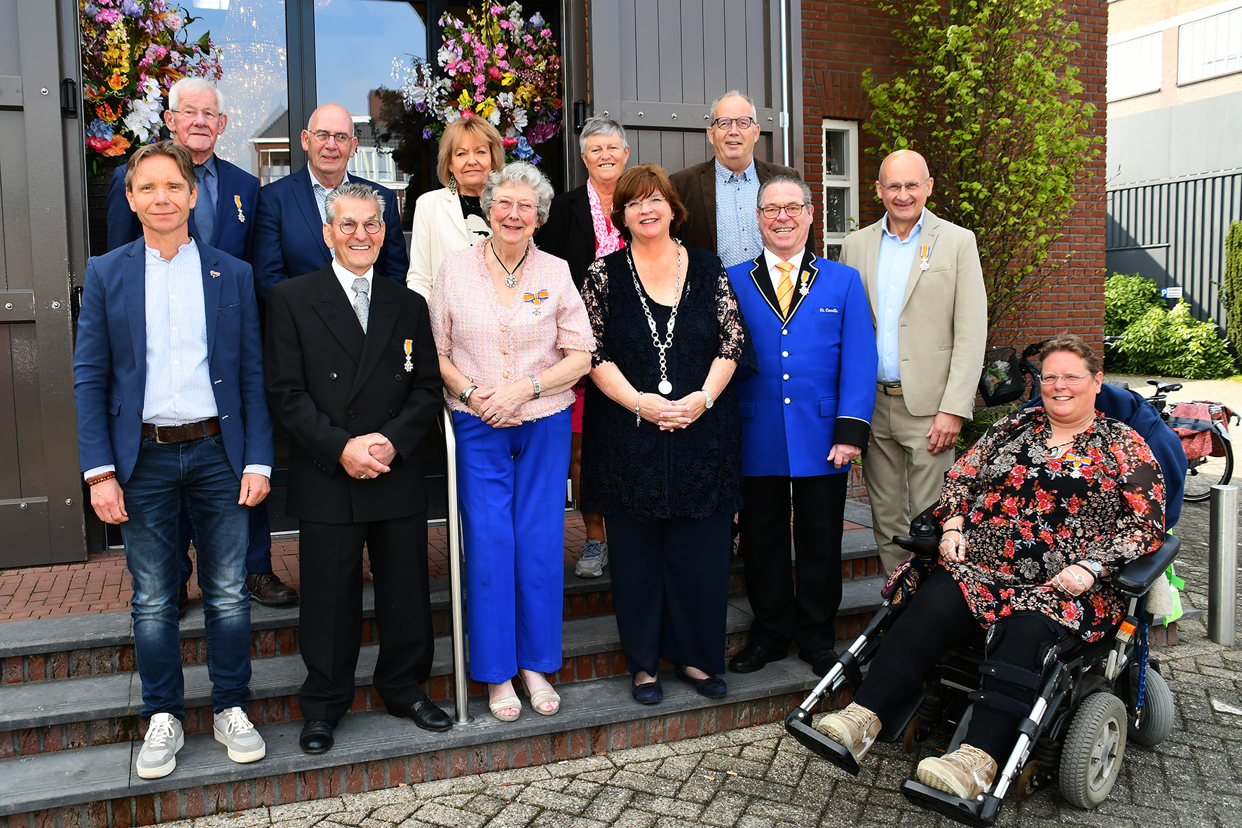 Groepsfoto van de mensen die in 2025 een lintje kregen.